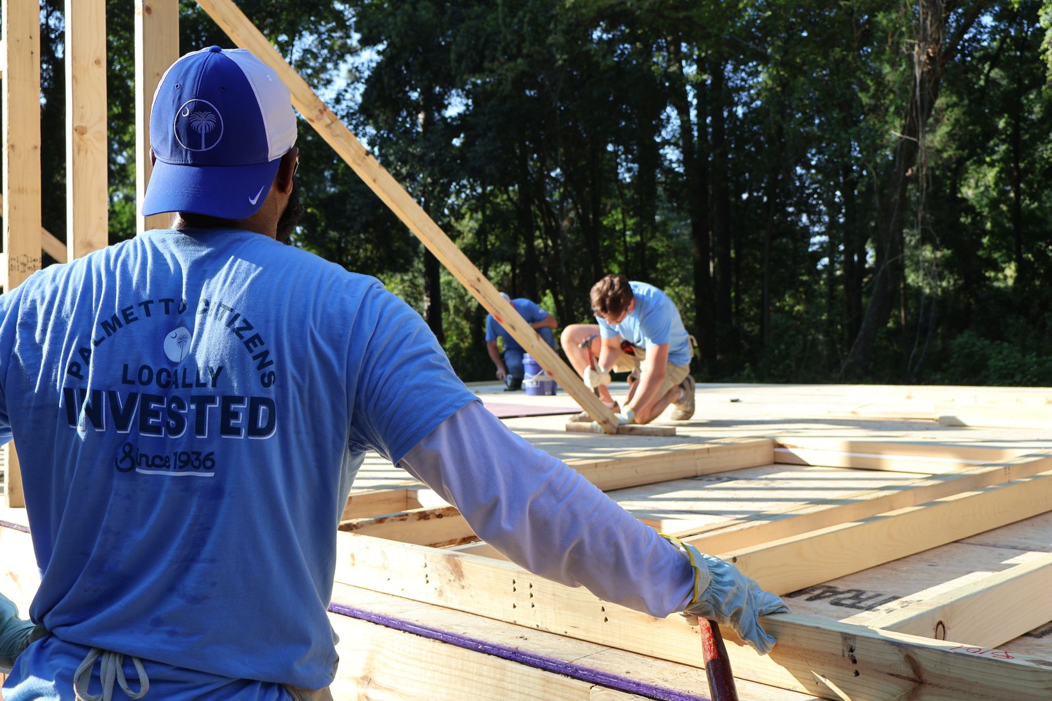 volunteers building a house